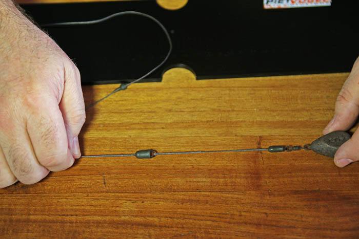 Stap 12. Bevestig het onderste deel met lood aan de quicklink van de daadwerelijke leader.