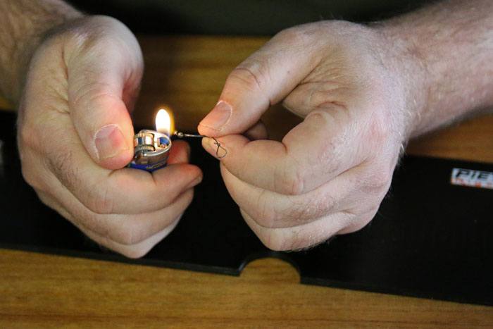 26. Brand het restant weg.